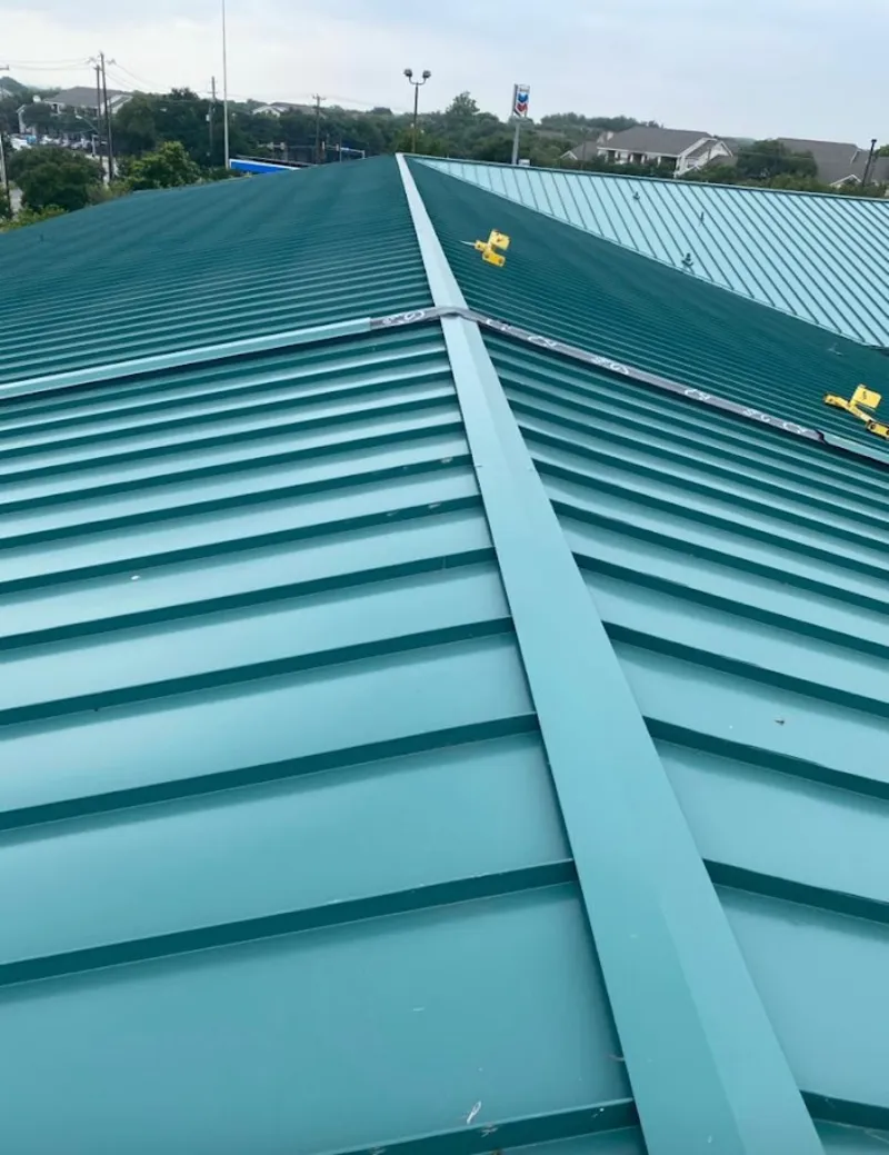 Green commercial metal roof ridge and valley for Metal Roof Repair in Lake Forest Park